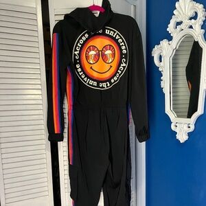 ZUMBA FITNESS JUMPSUIT. SIZE M. COLOR BLACK. ACROSS THE UNIVERSE COLLECTION.